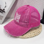 Pink cap with 'Jesus is my life' text on a textured surface