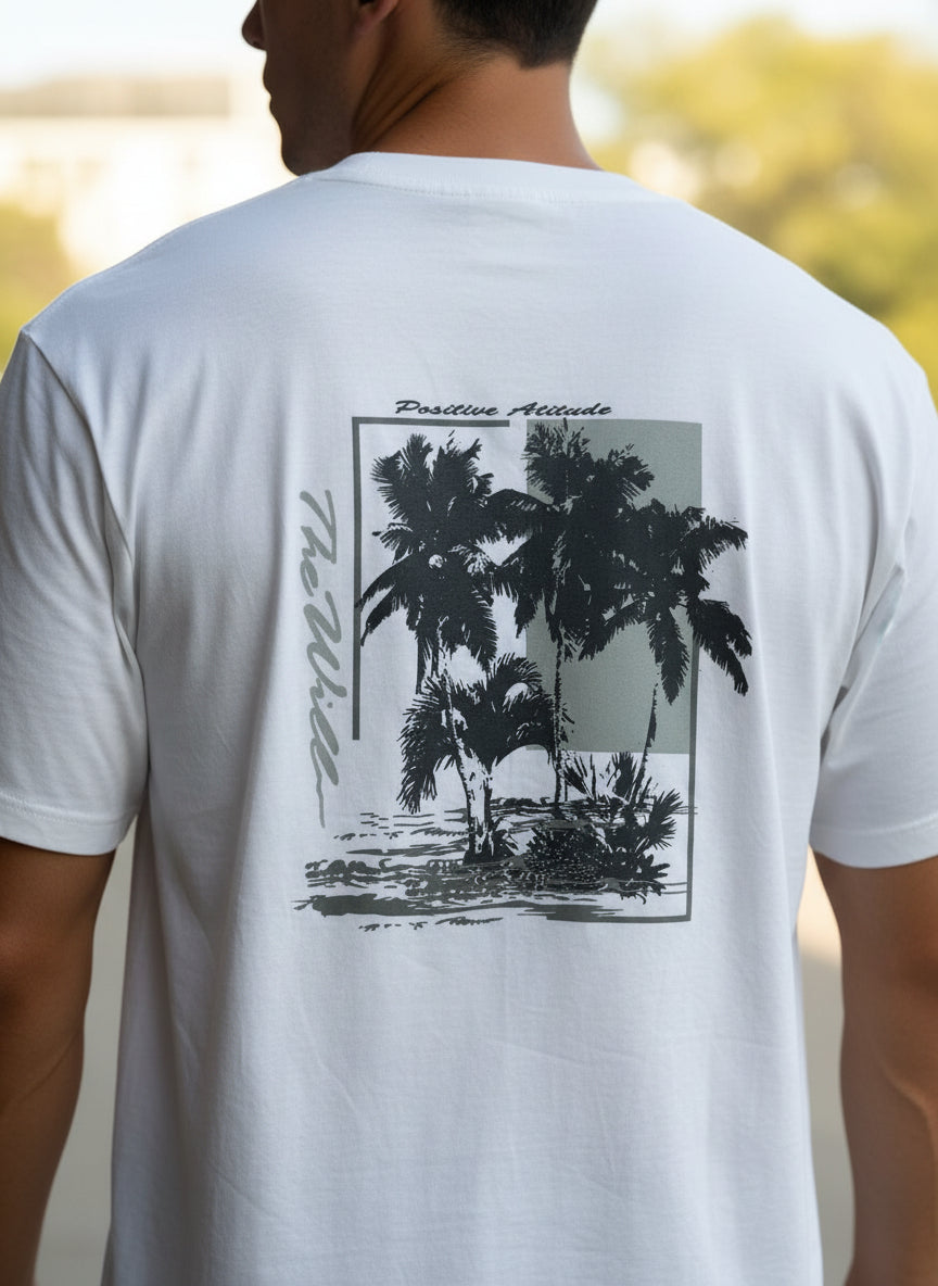 White t-shirt with palm tree design and 'Positive Attitude' text on a mannequin.