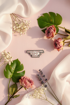 Flat lay lifestyle - Beautiful Isn't A Size pin