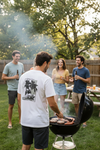 Man grilling at barbecue with friends